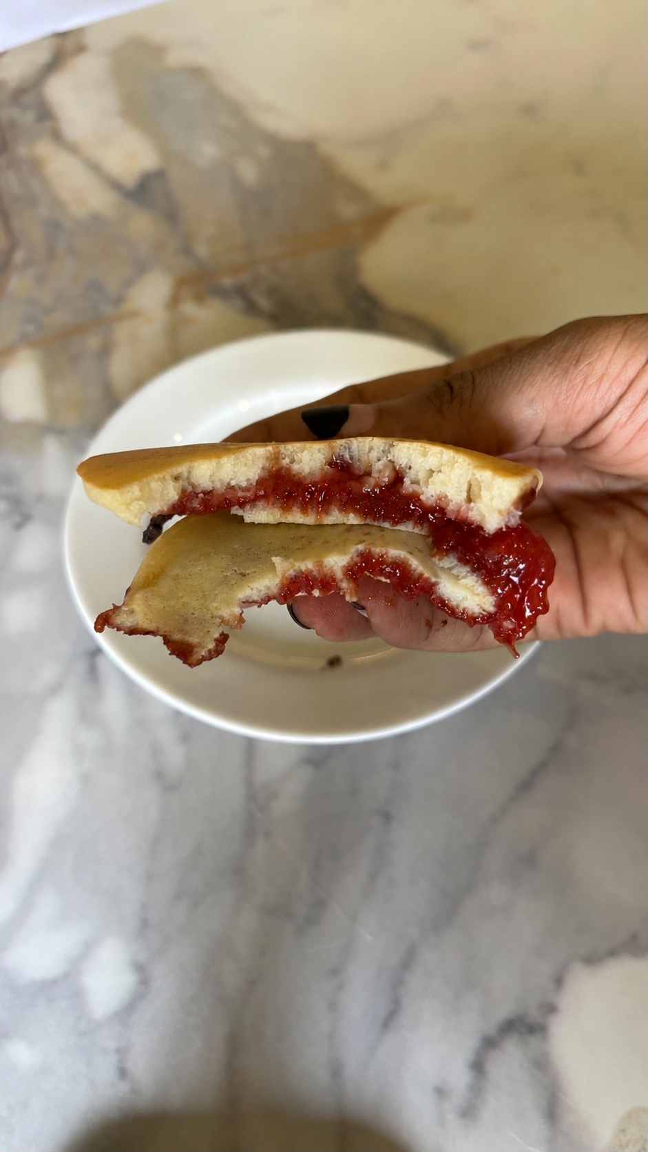 Pancakes with jam and berries